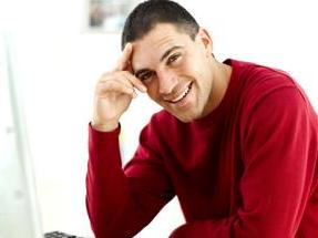 image of male business owner with a somewhat happy but bit of frustrated look on his face